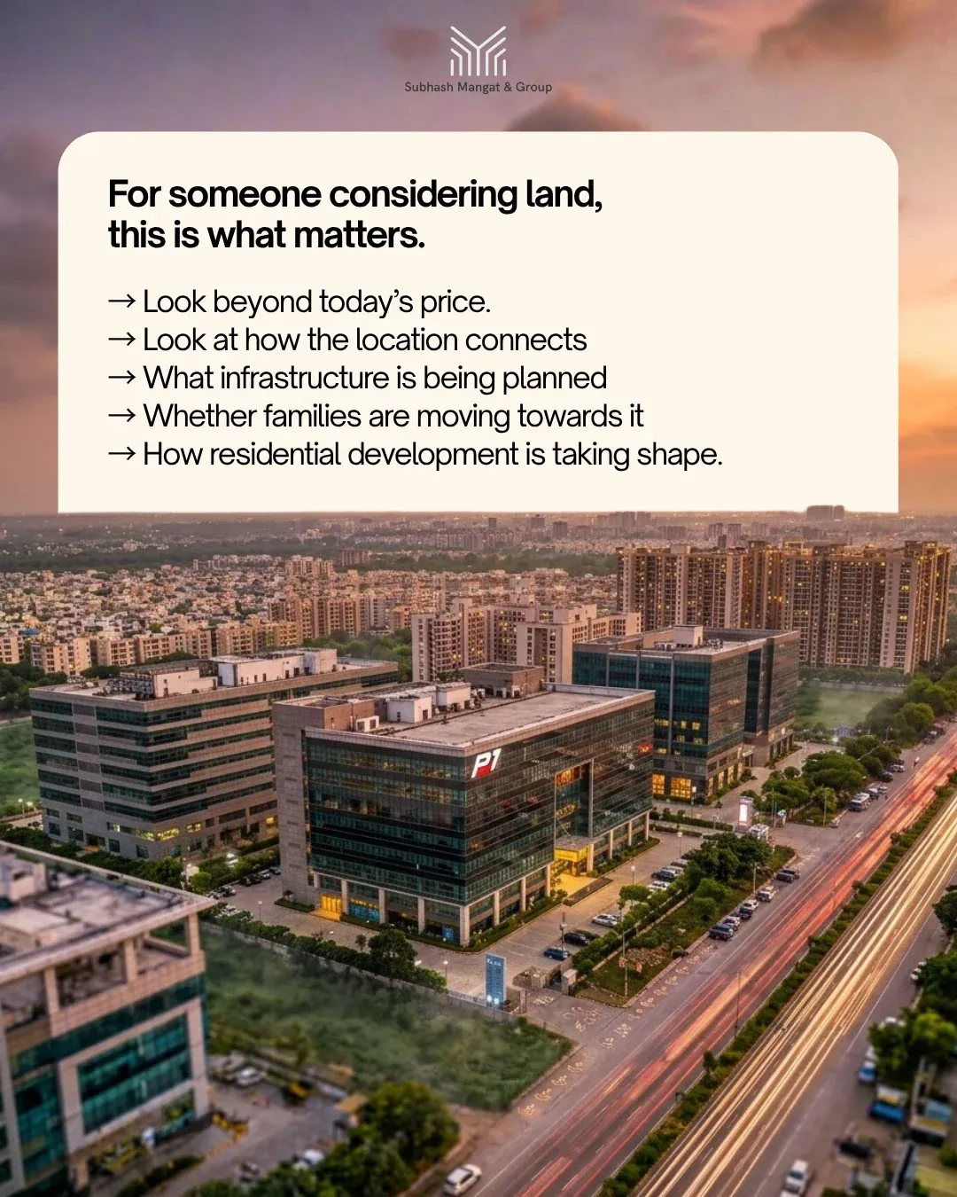 'For someone considering land, this is what matters', over an aerial view of the city at dusk.
