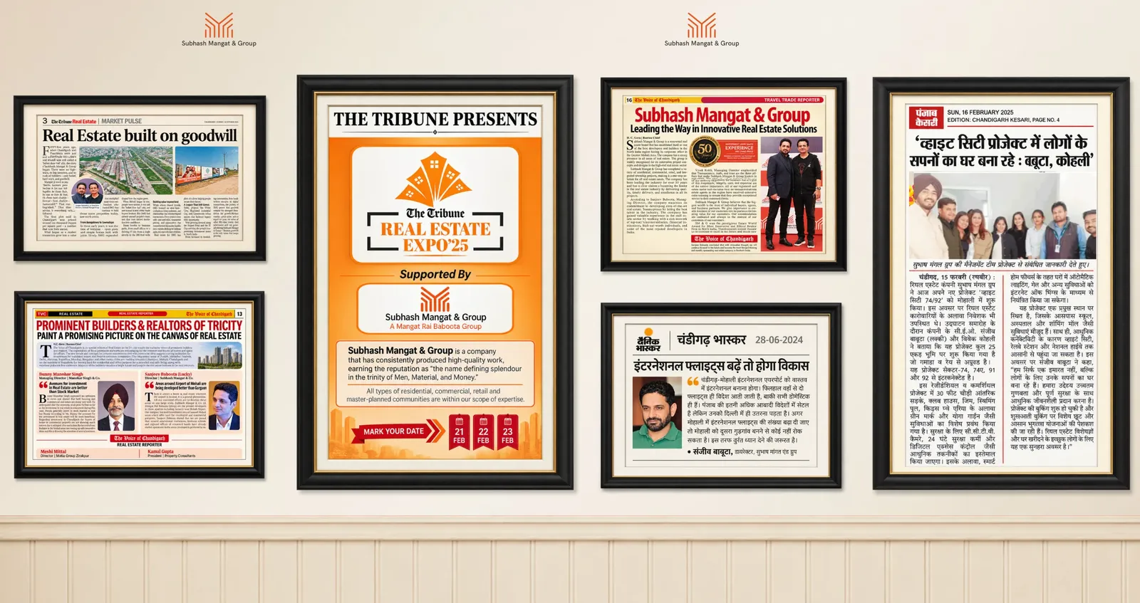 SMG in headlines, the press wall: framed clippings about the group from The Tribune, Dainik Bhaskar, Punjab Kesari and The Voice of Chandigarh, and The Tribune Real Estate Expo '25.